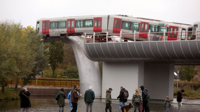 General view of a metro that crashed through a stop block and landed on an artwork of a whale tail at De Akkers subway station in Spijkenisse